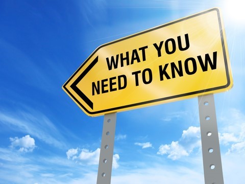 A sign that is pointing left and reads "what you need to know."